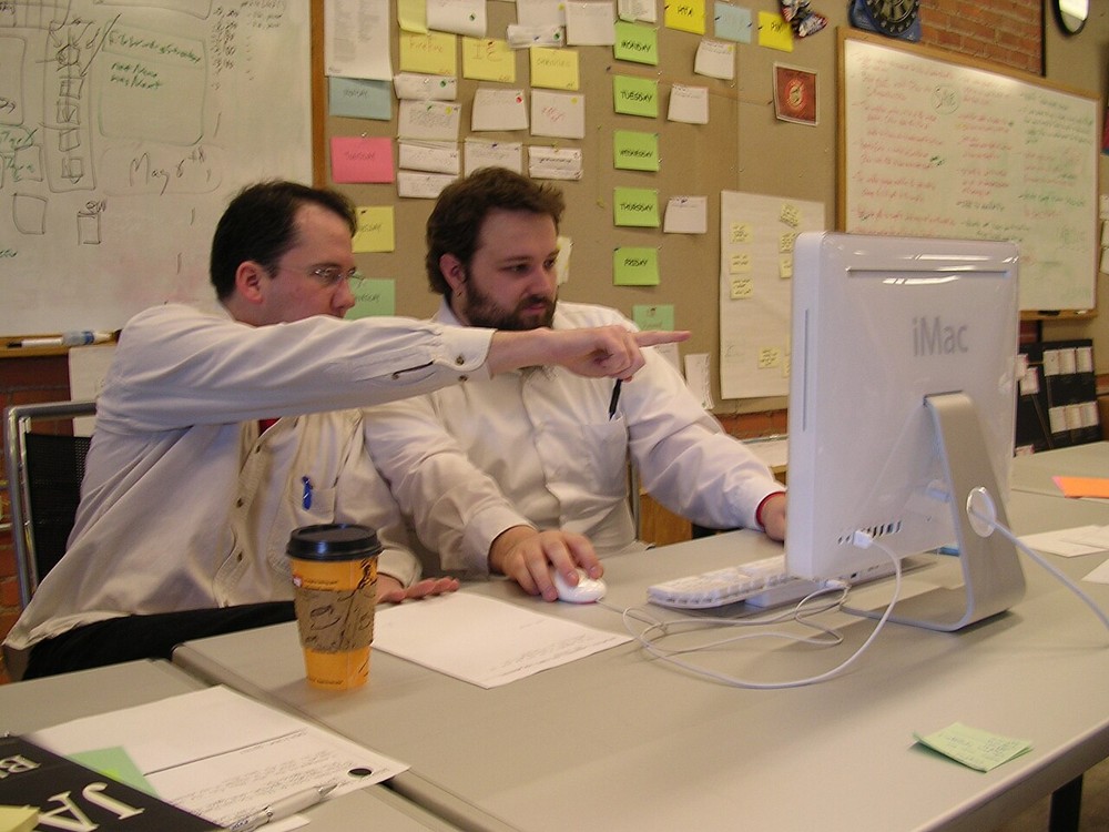 Developers working together at a computer